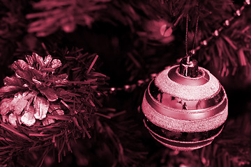 Image showing Christmas ornaments on tree.