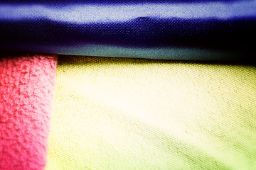 Image showing Yellow, pink and blue blanket