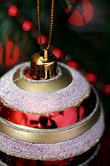 Image showing Christmas ornaments on tree.