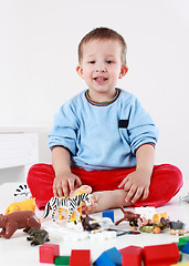 Image showing Lovely boy playing with blocks