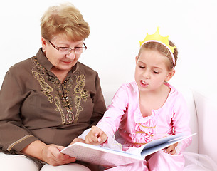 Image showing Reading with granny