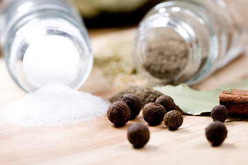 Image showing spices on wooden background 