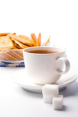 Image showing tea, sugar and cookies