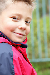 Image showing Positive boy turned head
