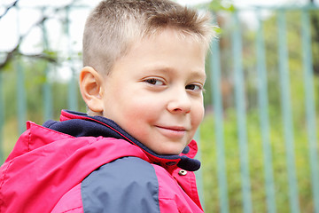 Image showing Cute boy turned head