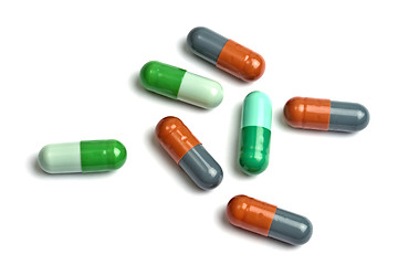 Image showing A few colorful capsules isolated on white 