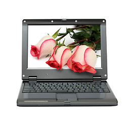 Image showing laptop with roses bouquet