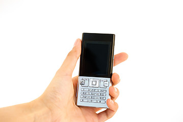 Image showing Mobile phone in hand isolated white.