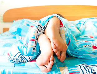 Image showing Sleeping woman's cute feet