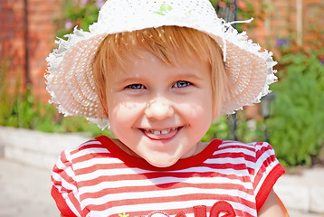 Image showing Portrait of a young girl in a white hat