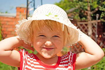 Image showing Portrait of a young girl in a white hat