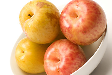 Image showing yellow green sweetie and red pluot fruits