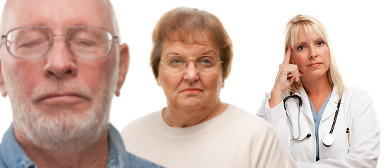 Image showing Concerned Senior Couple and Female Doctor Behind