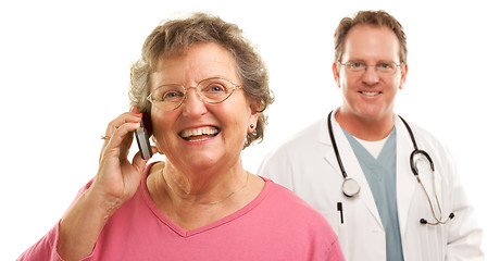 Image showing Happy Senior Woman Using Cell Phone with Male Doctor Behind