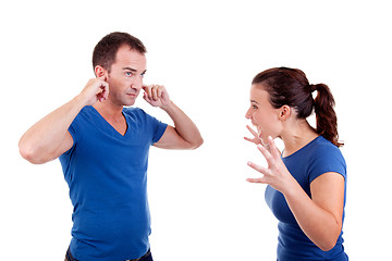 Image showing woman screaming with a man, him with hands covering his ears 