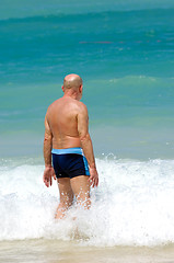 Image showing Senior man in water