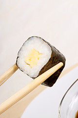 Image showing Chopsticks and sushi