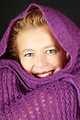 Image showing Woman with purple woolen scarf