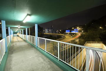 Image showing view on footbridge of modern urban city with Freeway Traffic at 
