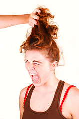 Image showing Don't pull my hair.