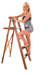 Image showing Girl on stepladder.