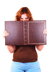 Image showing Woman holding book.