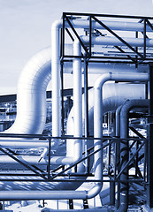 Image showing Pipes, tubes, machinery and steam turbine at a power plant 