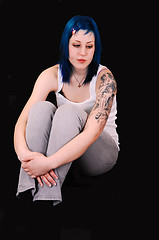 Image showing Sad blue haired girl.