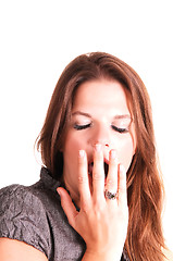 Image showing Young woman yawning.