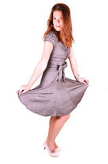 Image showing Pretty girl in gray dress.