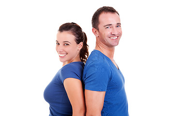 Image showing couple  back to back smiling,