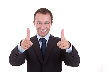 Image showing Young businessman with thumb raised as a sign of success