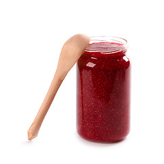 Image showing  homemade raspberry jam and wooden spoon