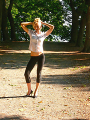 Image showing Lady standing in the park.