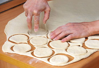 Image showing Hands od raw dough preparing pastry