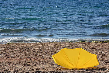 Image showing The bag on the sand