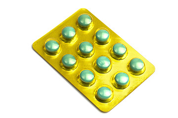 Image showing Package of green pills isolated on white 