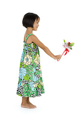 Image showing cute girl with flower gift