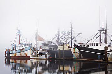 Image showing fishing boats in harbor fog