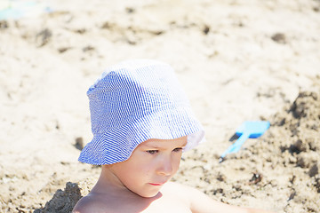 Image showing Serious girl on beach