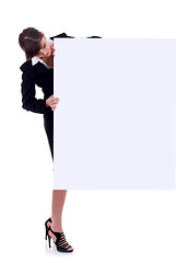 Image showing business women peeking