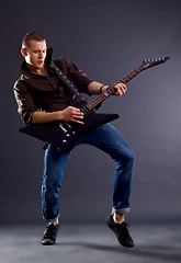 Image showing passionate guitarist