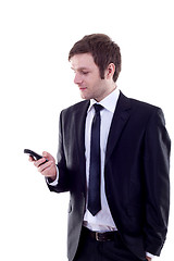 Image showing  man sending a text message