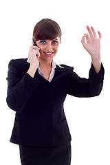 Image showing woman with phone and ok gesture