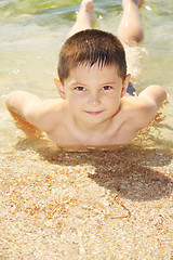 Image showing Kid on seashore
