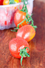 Image showing wet tomatoes closeup 