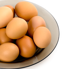 Image showing brown eggs in the plate