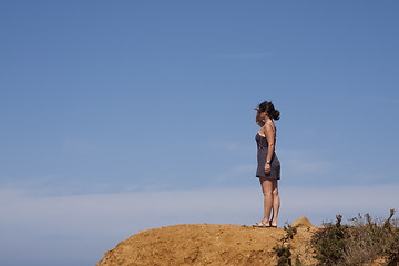 Image showing Woman at the cliff