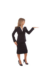 Image showing Businesswoman showing something