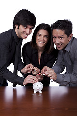 Image showing Group of people saving money